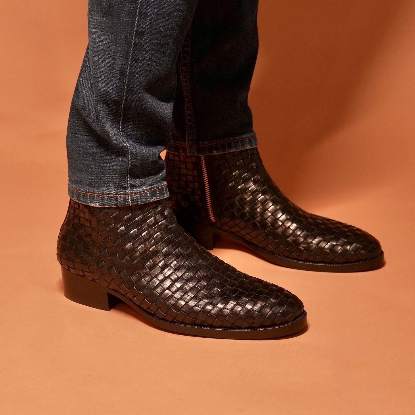 Sprazzo Tesso Nero black weaved leather boots with Cuban heel by dmodot.